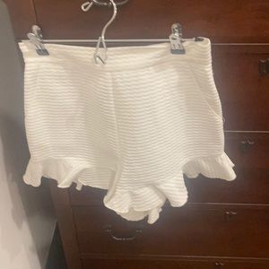 High waisted white shorts. Scalloped.